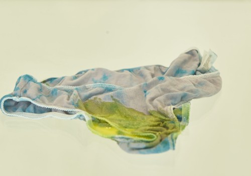 Photo of tie die underwear with a large amount of unnatural yellow goo on the crotch.